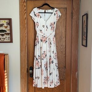 Free People "All I Got" floral tiered maxi dress.